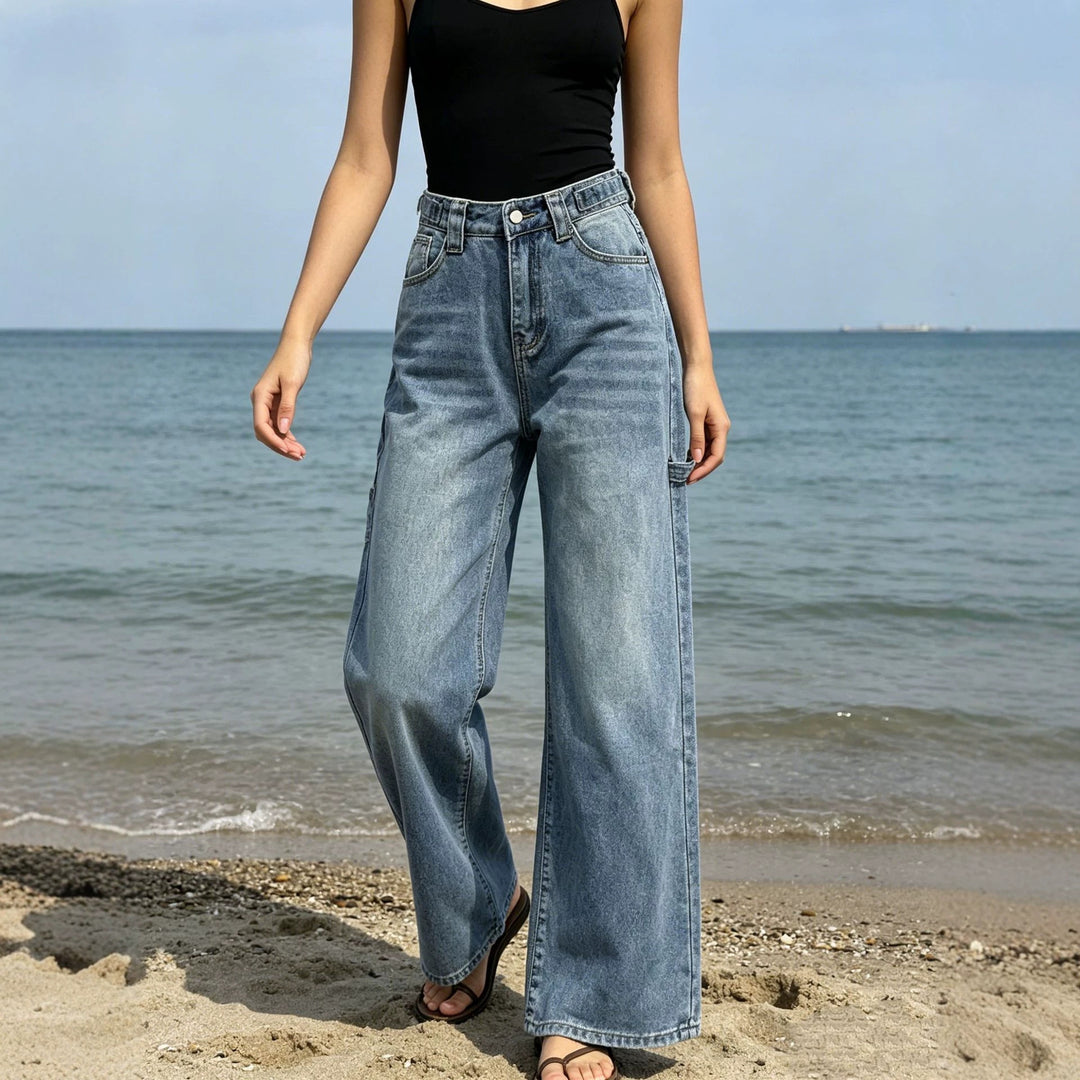 Damen nan weite High‑Waist Carpenter-Denimhose mit Utility-Seitentasche und ausgestelltem Bein Echo Archiv