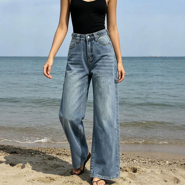 Damen nan weite High‑Waist Carpenter-Denimhose mit Utility-Seitentasche und ausgestelltem Bein Echo Archiv