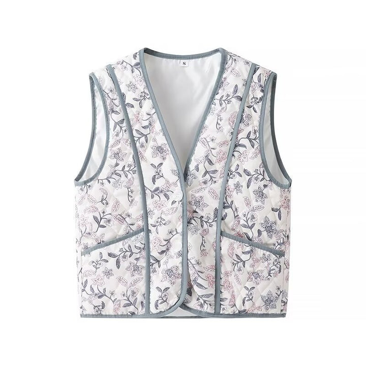 Damen Leicht gesteppte Steppweste mit floralem Print, V‑Ausschnitt und Eingrifftaschen Echo Archiv