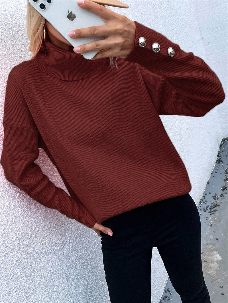 Damen Gerippter Rollkragenpullover mit Oversize-Schnitt und Zierknopfmanschetten Echoarchiv