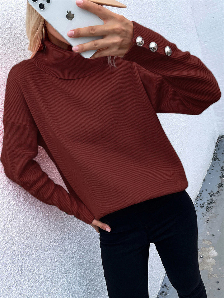 Damen Gerippter Rollkragenpullover mit Oversize-Schnitt und Zierknopfmanschetten Echoarchiv