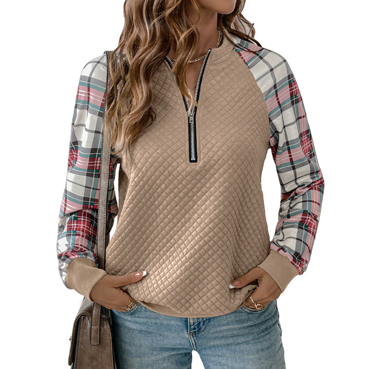 Damen Gesteppter Raglan-Sweatpullover mit halbem Reißverschluss und Karoärmeln Echoarchiv
