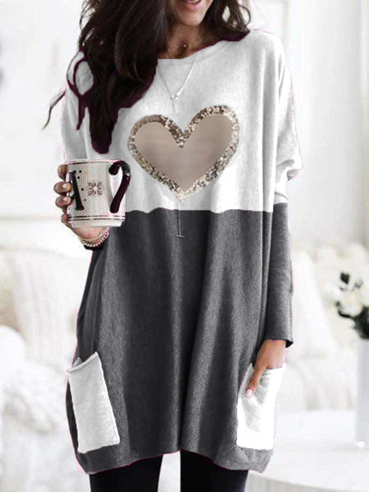 Damen Oversized Lange Pullover Tunika mit Pailletten-Herz und aufgesetzten Taschen Echoarchiv