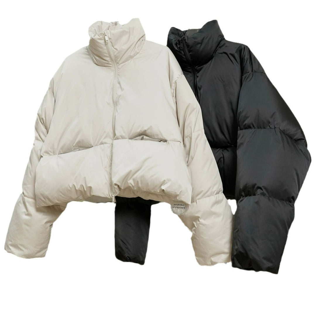 Damen Kurz geschnittene gesteppte Pufferjacke mit hohem Stehkragen und wärmeisolierender Füllung Echoarchiv