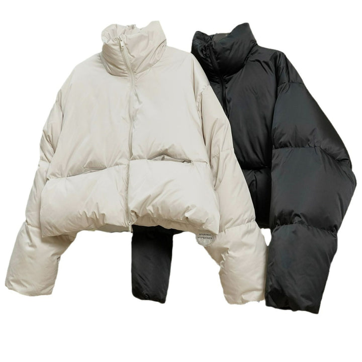 Damen Kurz geschnittene gesteppte Pufferjacke mit hohem Stehkragen und wärmeisolierender Füllung Echoarchiv