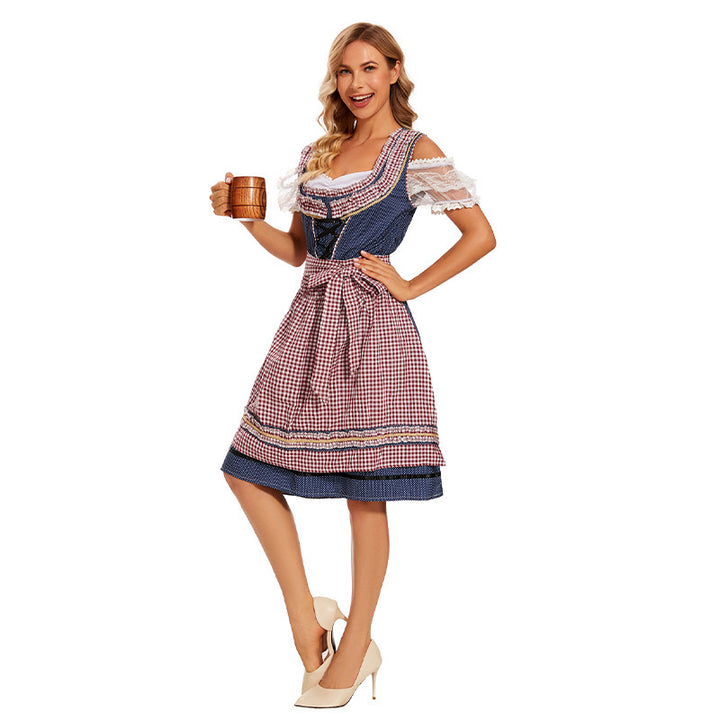 Damen nan traditionelles Trachtenkleid mit Schnürmieder, Spitzenärmeln und karierter Schürze Echo Archiv