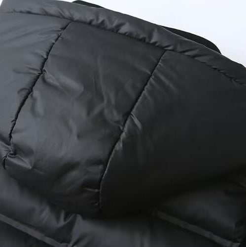 Damen Hybrid-Steppjacke mit Softshell-Ärmeln und Kapuze Echoarchiv