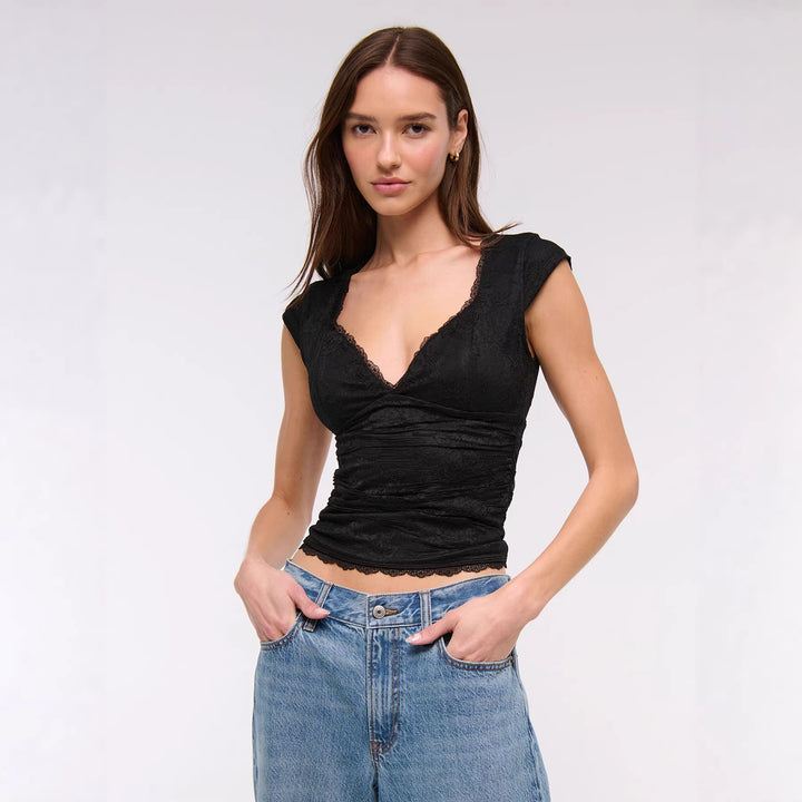 Damen Spitzen-Oberteil mit elegantem V-Ausschnitt und Rüschendetails Echo Archiv