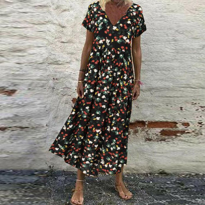 Damen nan V-Ausschnitt-Maxikleid mit feinem Faltenrock, Empire-Passe und Kurzarm Echo Archiv