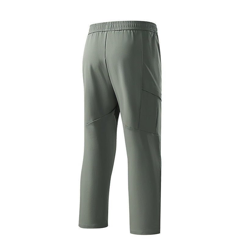 Herren Technische tapered Trainingshose mit elastischem Bund, 4‑Wege‑Stretch und Reißverschlusstaschen Echo Archiv