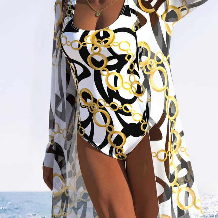 Damen eleganter Einteiler Badeanzug mit transparentem Überwurf und modernem Ringdesign Echo Archiv