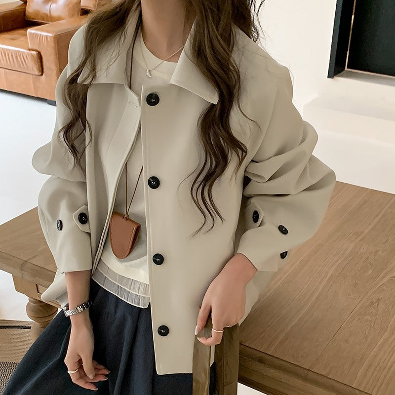 Damen Oversize Kurzjacke mit überschnittenen Schultern und großer Knopfleiste Echoarchiv