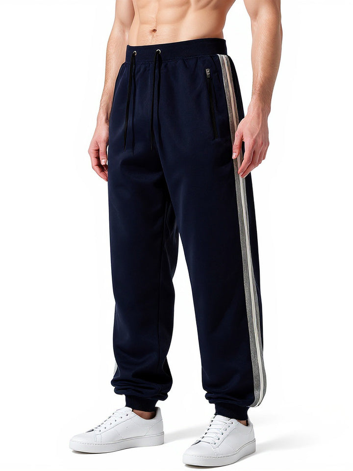 Herren Sportliche Jogginghose mit elastischem Bund und seitlichen Reißverschlusstaschen Echo Archiv