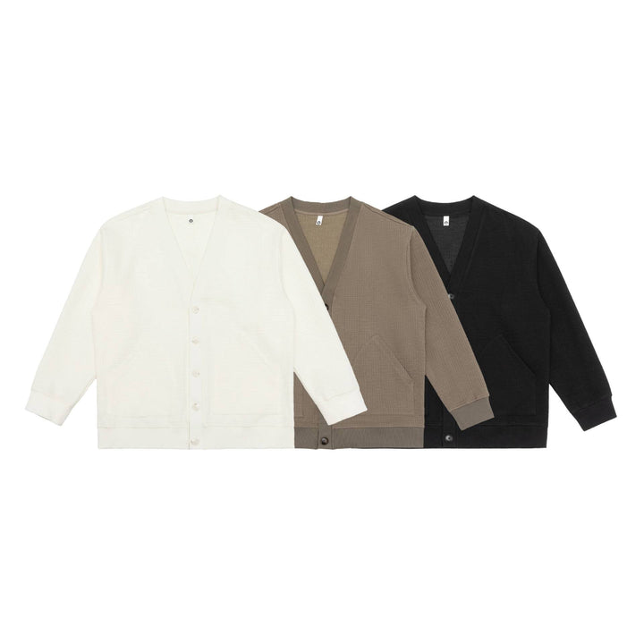 Unisex Waffelstruktur-Cardigan mit V-Ausschnitt, Knopfleiste und aufgesetzten Eingrifftaschen Echoarchiv