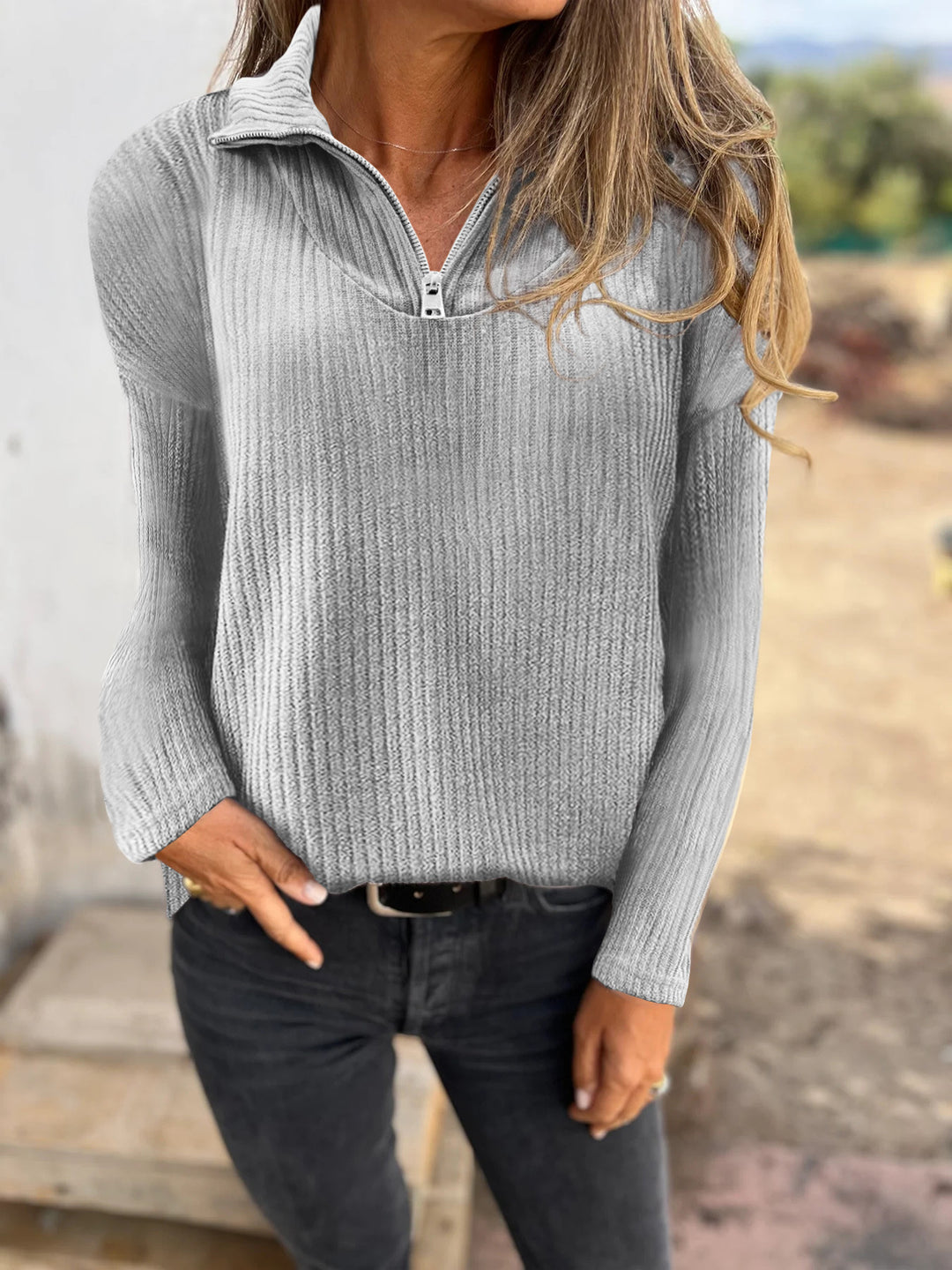 Damen Rippstrickpullover mit halbem Reißverschluss und Stehkragen Echoarchiv