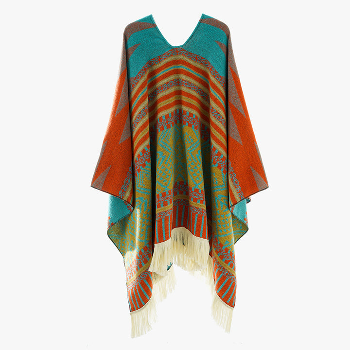 Damen Jacquard‑Ruana im Deckenstil mit V‑Ausschnitt, geometrischem Ethno‑Muster und Fransensaum – Avérine