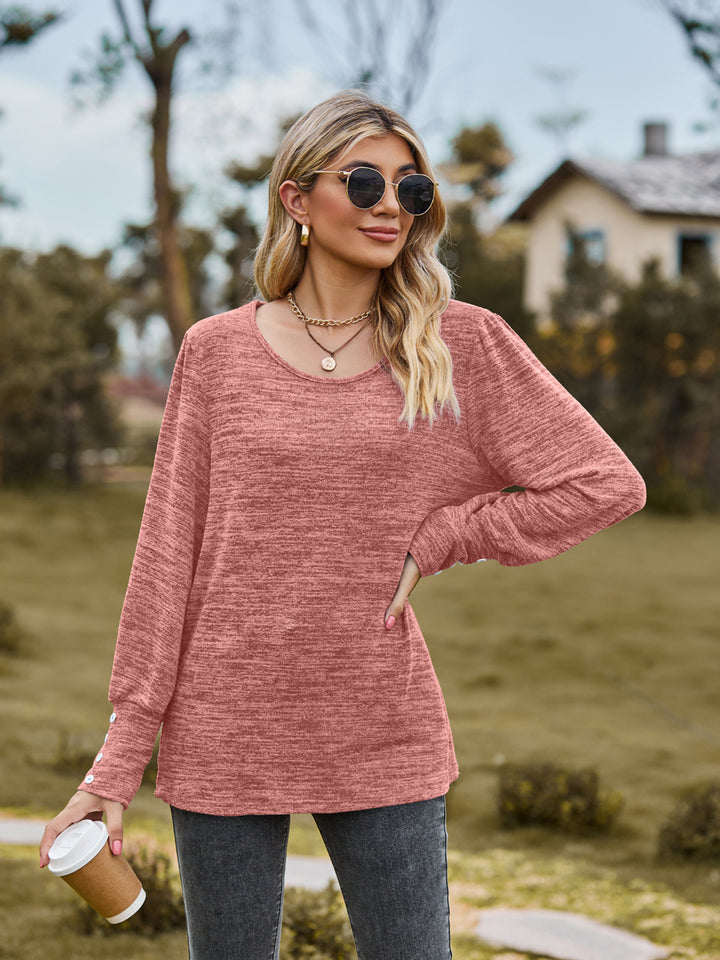 Damen Lässiges Langarmshirt mit Knopfmanschetten und weitem Rundhalsausschnitt Echo Archiv
