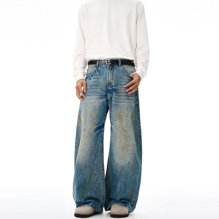Herren Ultraweite Denim-Baggyhose im Vintage-Look mit Farbpatina und tiefem Schritt Echo Archiv