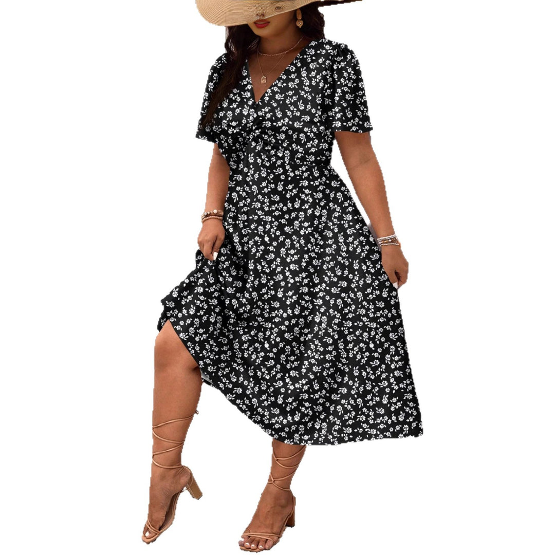 Damen Midi-Kleid mit Blumenmuster und vorteilhaftem Schlitz Echo Archiv