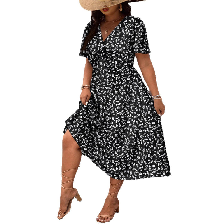 Damen Midi-Kleid mit Blumenmuster und vorteilhaftem Schlitz Echo Archiv