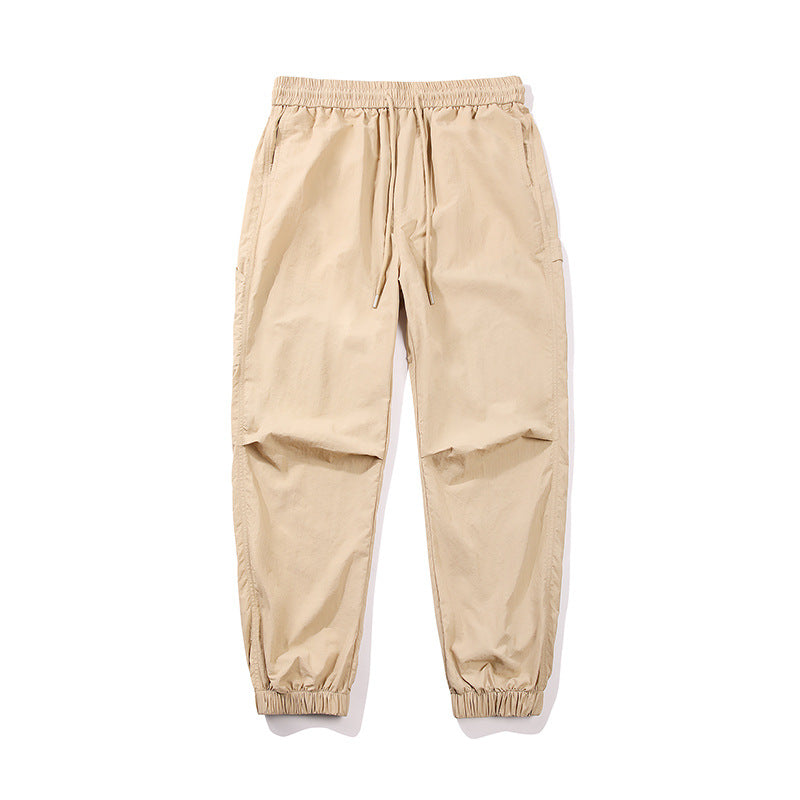 Herren Nylon-Mix Relaxed-Jogger mit elastischem Komfortbund, verdeckten Reißverschlusstaschen und geripptem Knöchelabschluss Echo Archiv