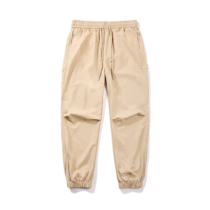 Herren Nylon-Mix Relaxed-Jogger mit elastischem Komfortbund, verdeckten Reißverschlusstaschen und geripptem Knöchelabschluss Echo Archiv