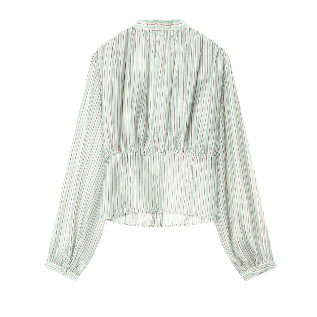 Damenbluse mit tiefem V-Ausschnitt und eleganten Rüschendetails Echo Archiv