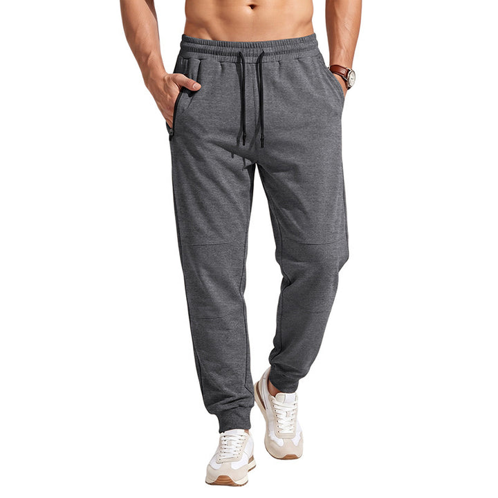 Herren Slim-Fit Jogginghose mit Kordelzug, Reißverschlusstaschen und Rippbündchen Echoarchiv