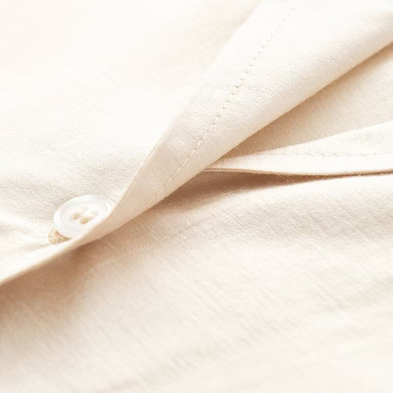 Damen Oversize-Bluse mit Reverskragen und durchgehender Knopfleiste Echoarchiv