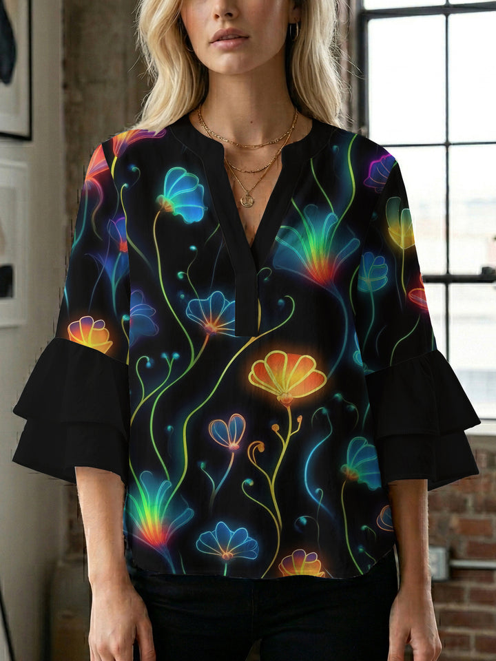 Damen Bluse mit voluminösen Rüschenärmeln und floralem Muster Echo Archiv