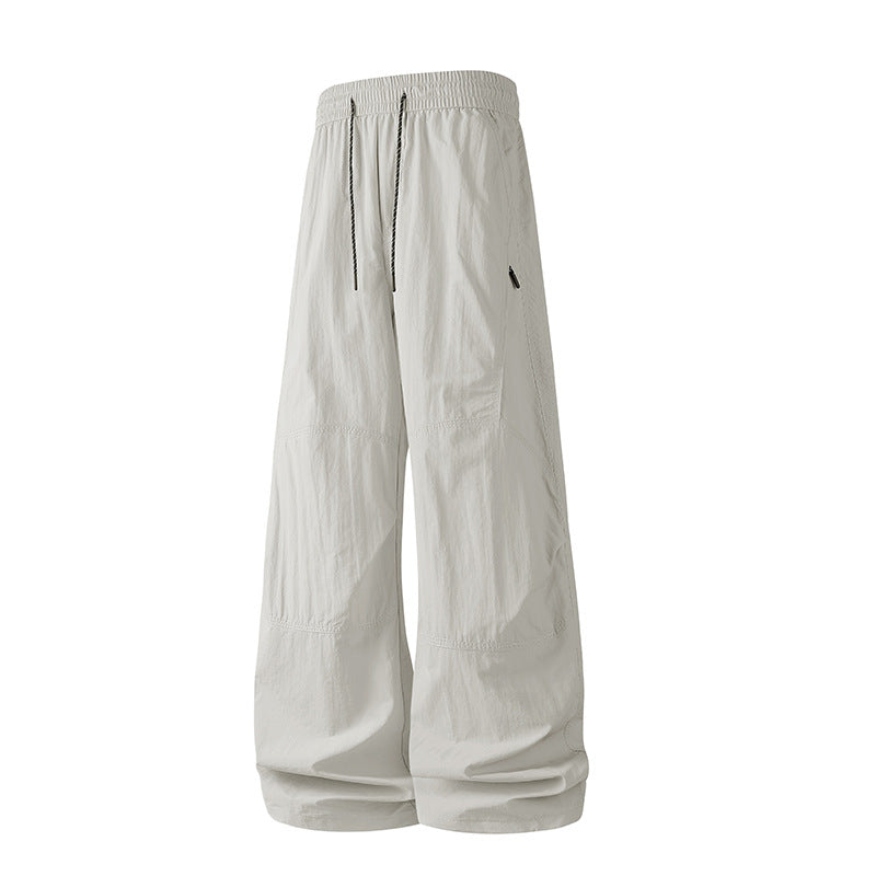 Herren Weite Baggy‑Hose mit Tunnelzugbund und Paneel‑Konstruktion Echo Archiv