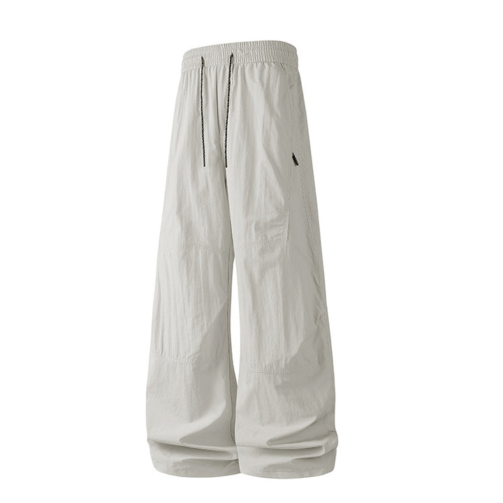 Herren Weite Baggy‑Hose mit Tunnelzugbund und Paneel‑Konstruktion Echo Archiv