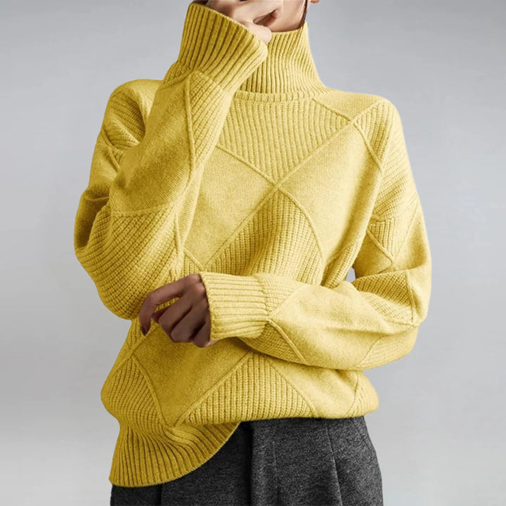 Damen nan weit geschnittener Strickpullover mit hohem Rollkragen und Rautenmuster Echo Archiv