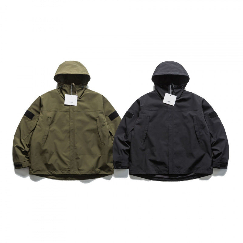 Unisex Oversize-Utility-Regenjacke mit Kapuze und verdecktem Reißverschluss Echo Archiv