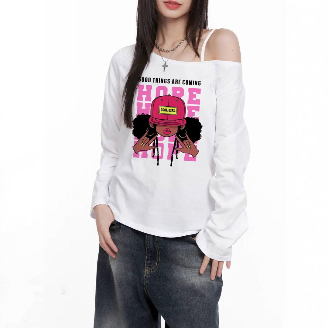 Damen lässiges Off-Shoulder Langarmshirt mit großflächigem Cartoon-Grafikprint und elastischem Baumwollmix – Avérine