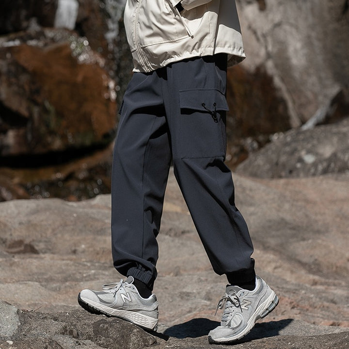 Herren Weite Relaxed-Cargo-Freizeithose mit Tunnelzugbund & Multifunktions‑Taschen Echoarchiv