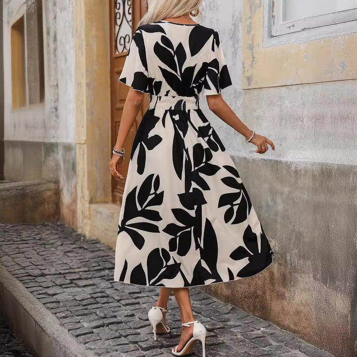 Damen nan Wickel-Midikleid mit elastischem Smokbund, weitem Fledermausärmel und hohem Beinschlitz Echo Archiv