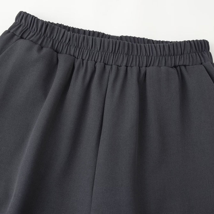 Damen Weite High‑Waist Jogginghose mit elastischem Bund, Eingrifftaschen und gerafften Beinabschlüssen Echoarchiv