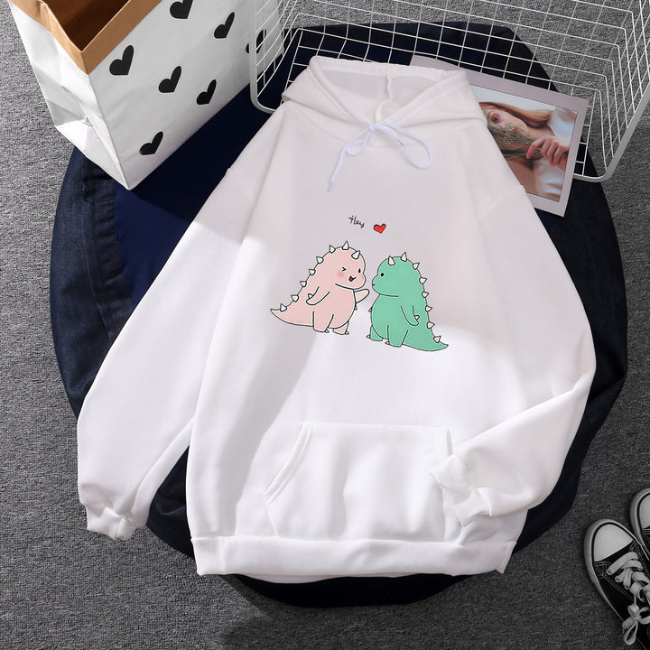 Damen Kapuzenpullover mit niedlicher Dinosaurierpärchen‑Illustration, Oversize‑Schnitt und Kängurutasche – Auréline
