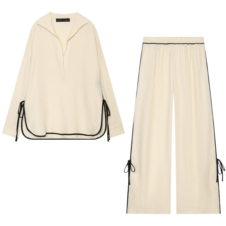 Damen Oversize Tunika-Pullover mit Polo-Kragen und seitlichen Zierbändern Echo Archiv
