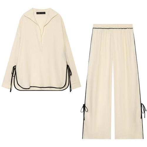 Damen Oversize Tunika-Pullover mit Polo-Kragen und seitlichen Zierbändern Echo Archiv
