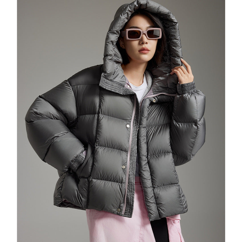 Damen Kurze Boxy‑Steppjacke mit Oversize‑Ärmeln, hohem Thermokragen und Kapuze Echoarchiv