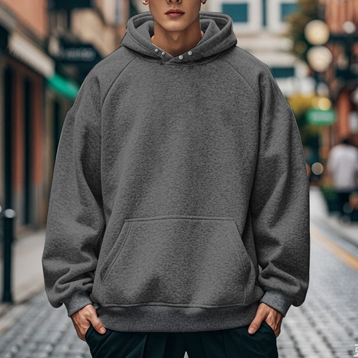 Herren nan oversized Kapuzenpullover mit Kängurutasche, Raglanärmeln und gerippten Bündchen Echo Archiv