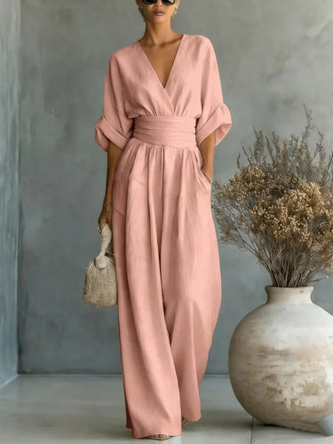 Echoarchiv | Eleganter Ärmelloser Jumpsuit mit Tiefem V-Ausschnitt, Taillenbund und Weitem Bein