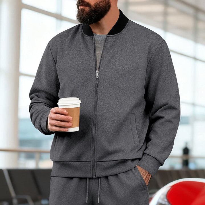 Herren nan urbane Sweat-Trackjacke mit Stehkragen verdecktem Reißverschluss elastischen Rippbündchen und Eingrifftaschen Echo Archiv