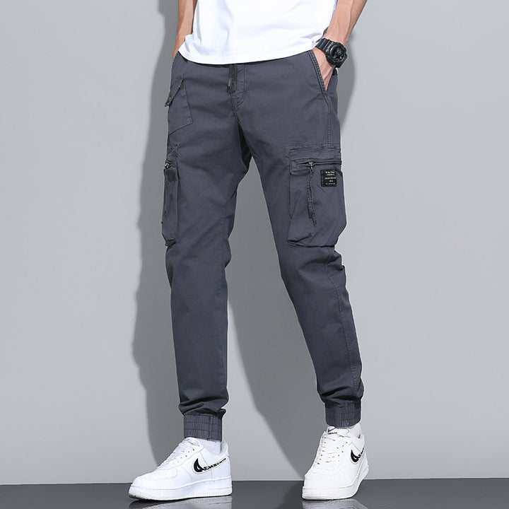 Herren Tapered-Utility-Cargohose mit elastischem Tunnelzugbund, großen Klapp­taschen und gerippten Bündchen Echo Archiv
