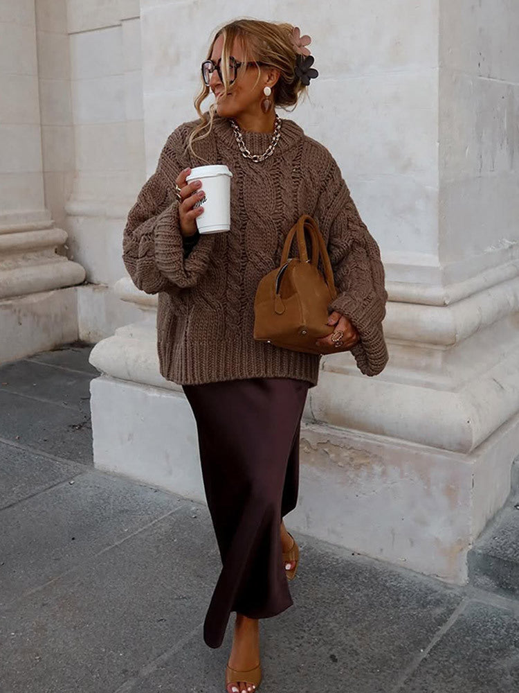 Damen Oversize Grobstrickpullover mit Zopfstrick, hohem Kragen und verlängerten Ärmeln Echoarchiv