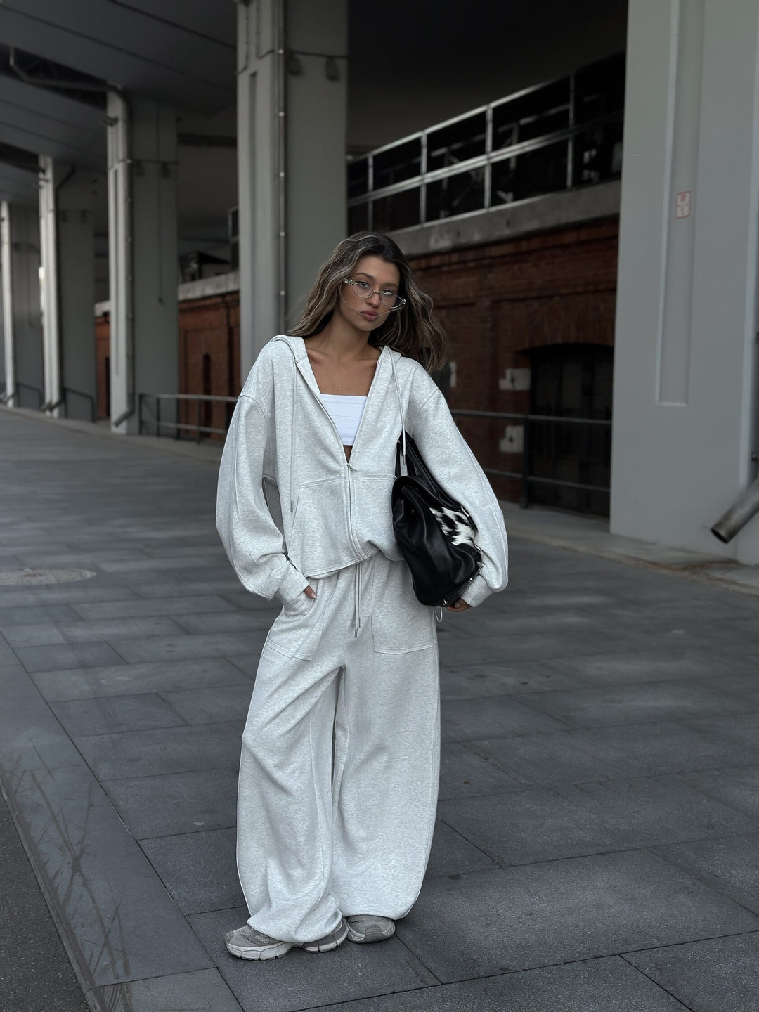 Damen nan oversized Kapuzenjacke mit Reißverschluss und Kängurutasche Echo Archiv
