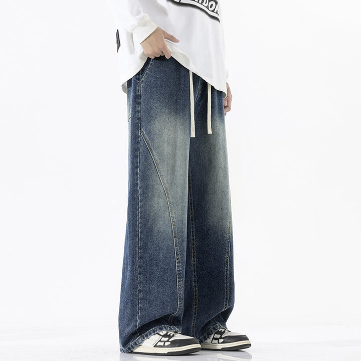 Herren Skulpturale Baggy-Denimhose mit tiefem Schritt und abgerundetem Saum Echo Archiv