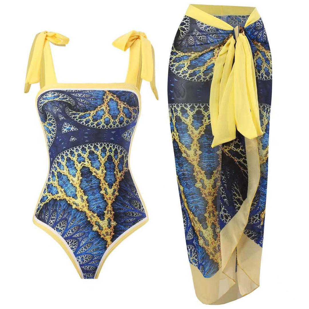 Damen Einteiler Badeanzug mit asymmetrischem Schnitt und eleganter Palazzo-Hose Echo Archiv